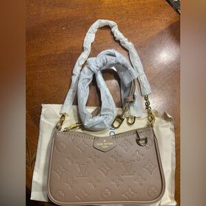 Louis Vuitton Easy Pouch On taupe Crossbody or shoulder bag NWOT